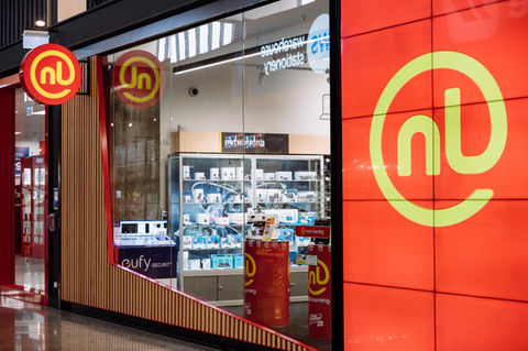 Noel Leeming store front with 'nl' logo and mobile phone accessories display